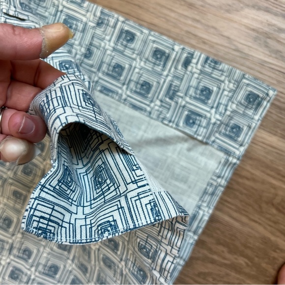 Crate & Barrel 50x84 curtain panel tan with teal pattern - Picture 11 of 11